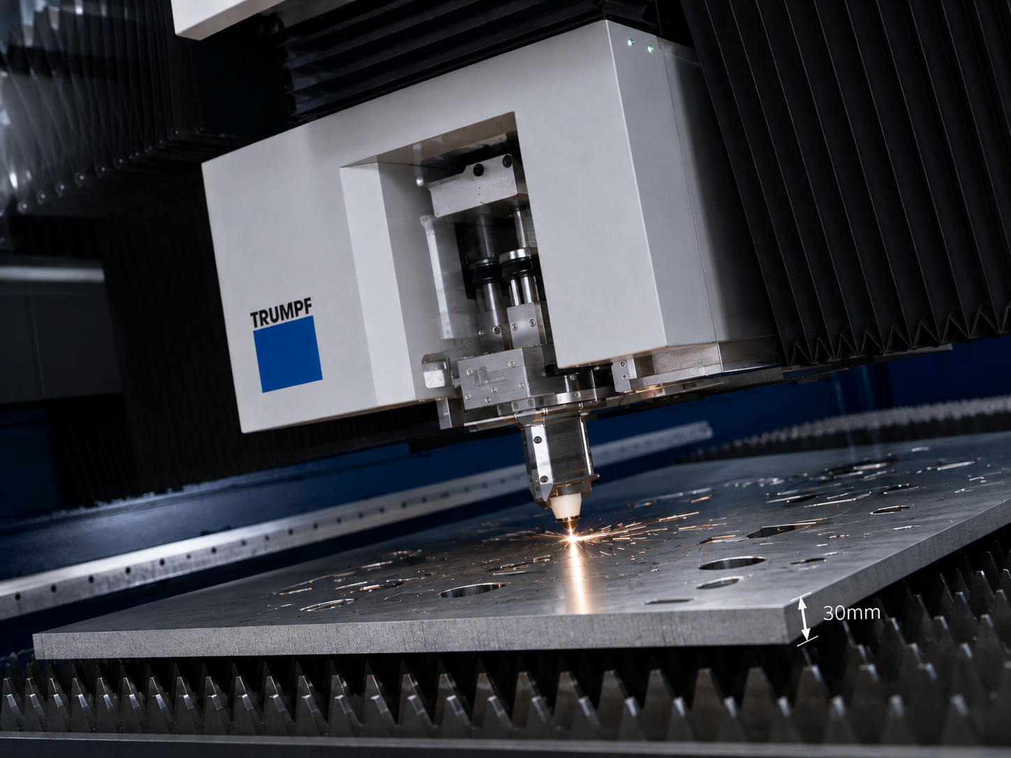 Trumpf 12kW fibre laser cutting thick mild steel at Grenville Engineering.