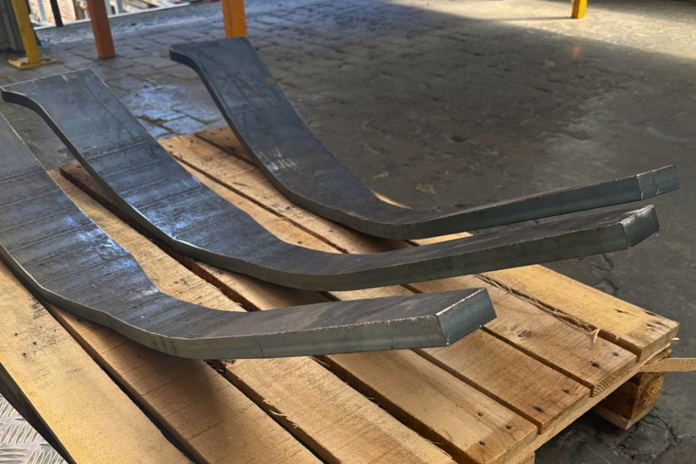 Trumpf 12kW fibre laser cutting thick mild steel at Grenville Engineering.